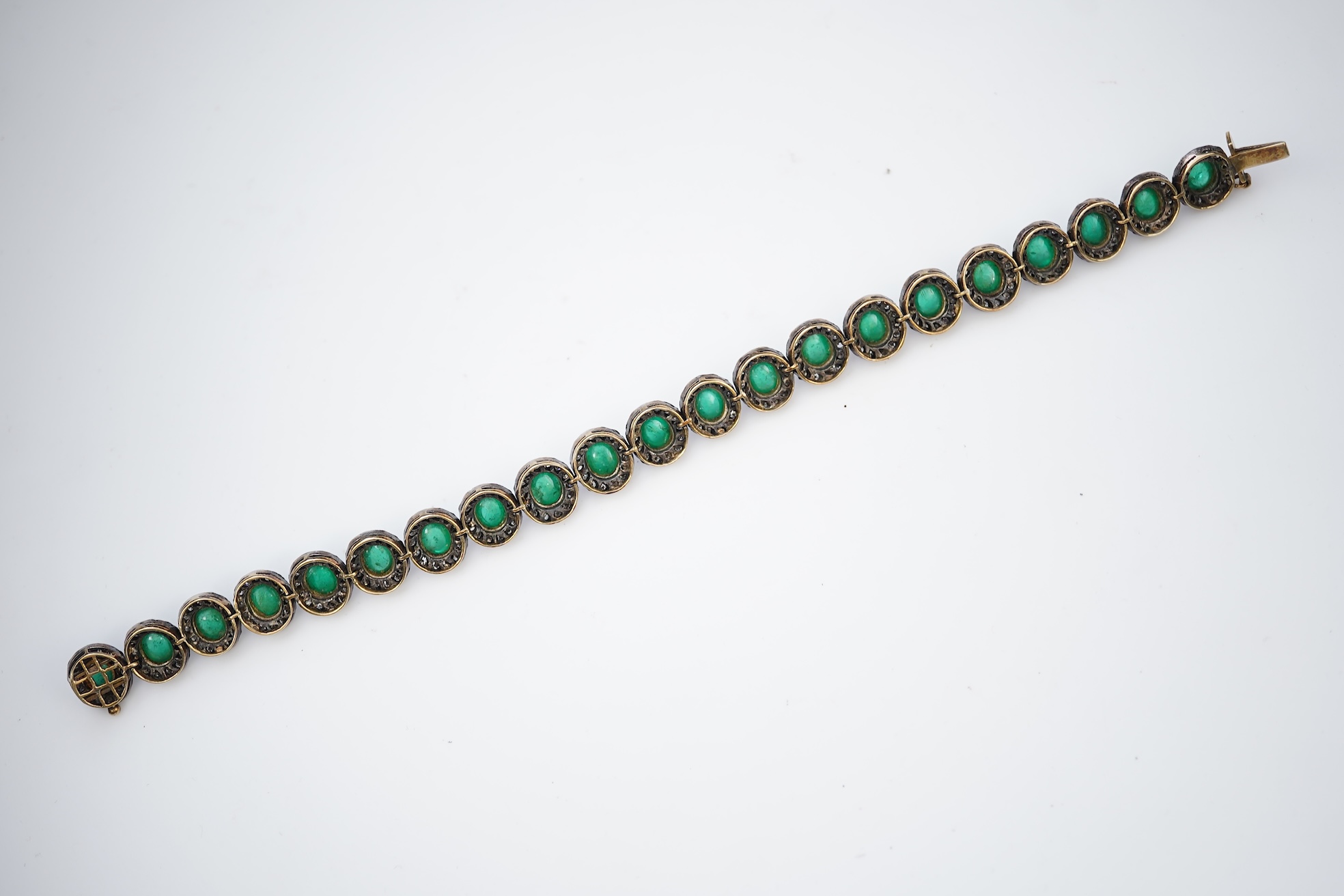 An emerald and diamond bracelet